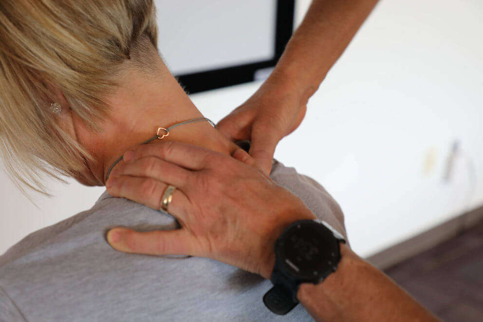 Practitioner working on a patient's shoulder